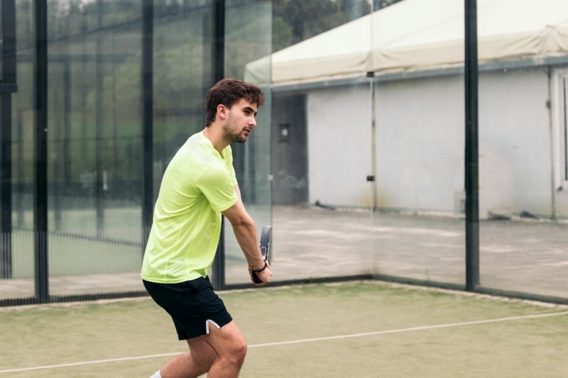 Outdoor padel match Padel player in action on an outdoor court