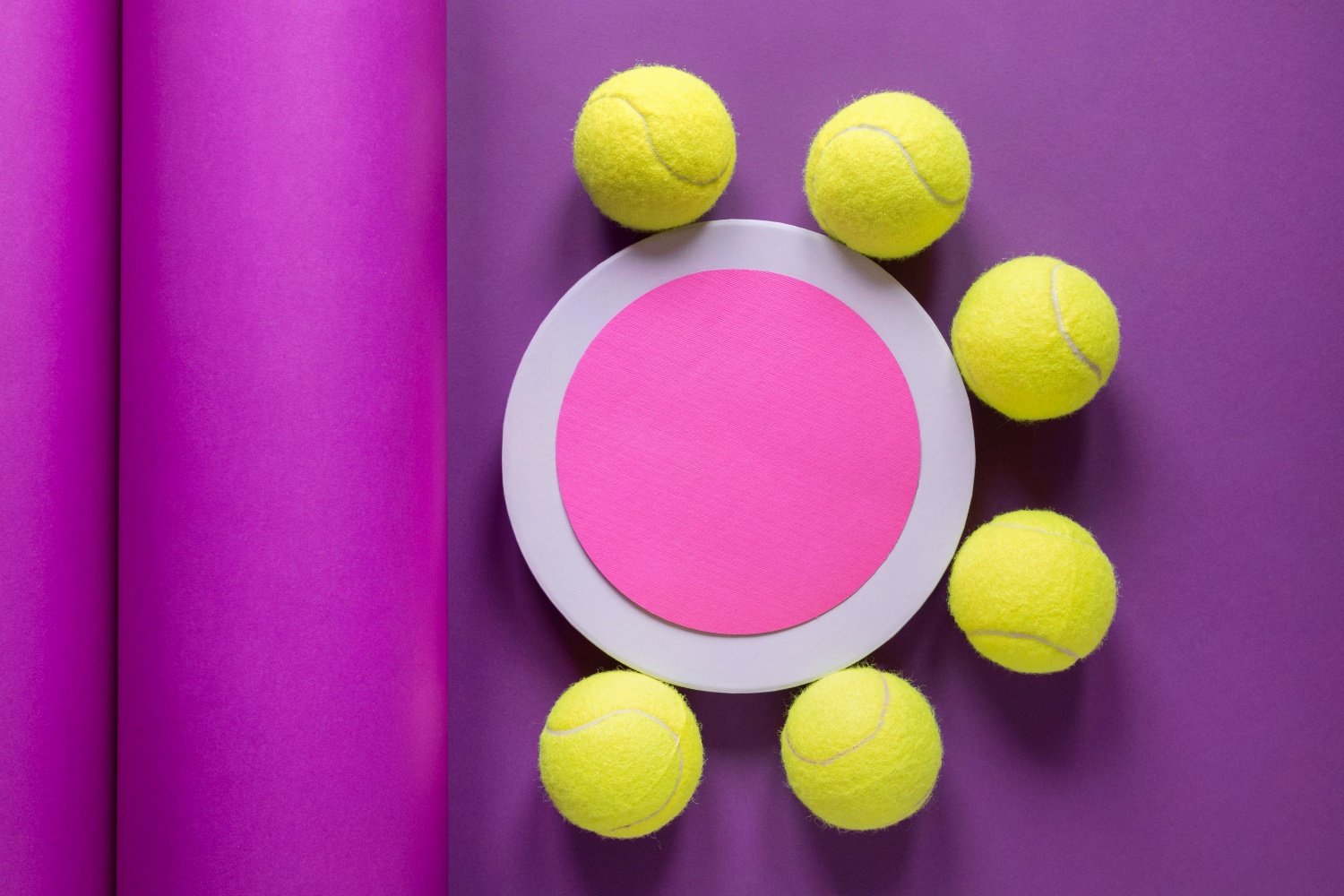 Padel Balls Arrangement Padel balls arranged around pink circle on purple background