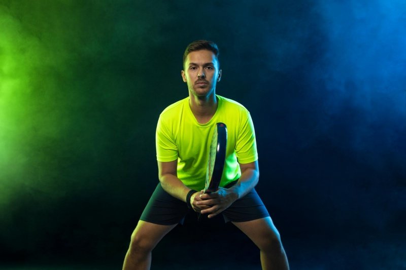 Padel game anticipation Padel player in a focused ready position