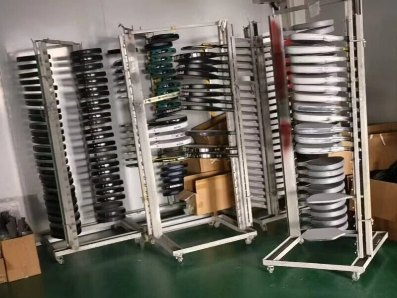 padel paddle drying racks padel paddle frames hanging on drying racks in factory