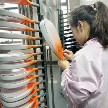 Quality control inspection of finished padel rackets before shipment